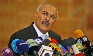 Saleh speaks to the press in Sanaa, Yemen, Monday