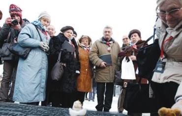 Holocaust survivors at Auschwitz