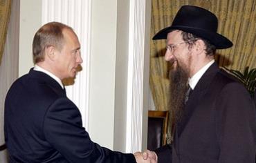 Russian President Vladimir Putin, left, meeting with the Chief Rabbi of Russia Berel Lazar, 2005