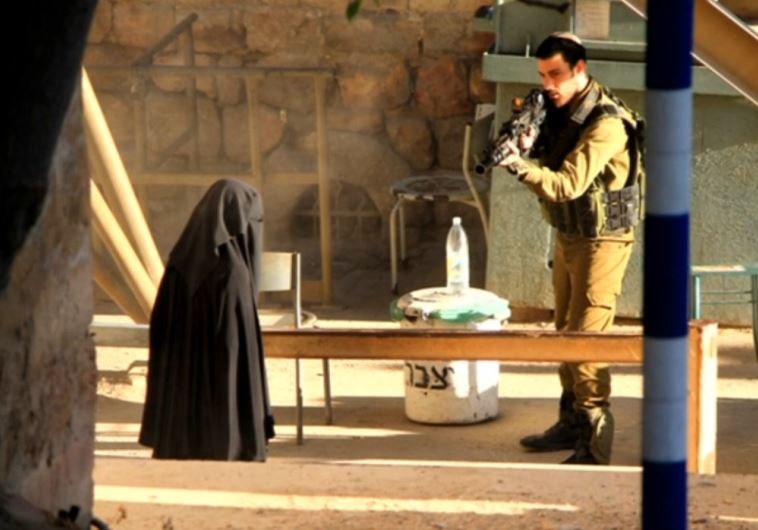 Palestinian woman shot after stabbing Israeli's in Jerusalem. - Page 2 ShowImage