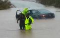 Police rescue driver in flood‏