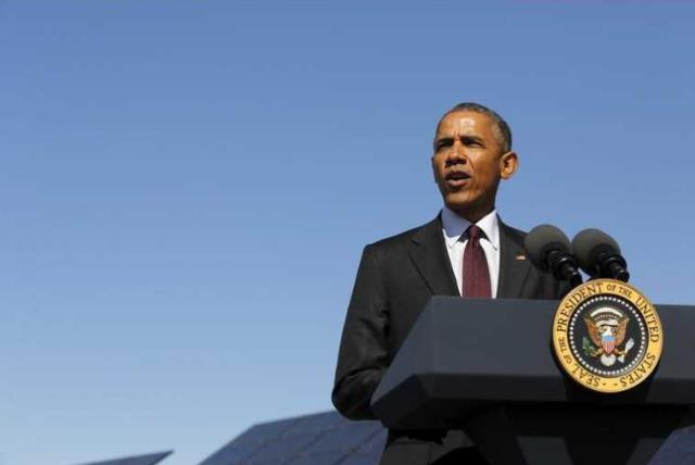 US President Barack Obama delivers remarks on clean energy after a tour of a solar power array at Hill Air Force Base, Utah (photo credit: REUTERS)