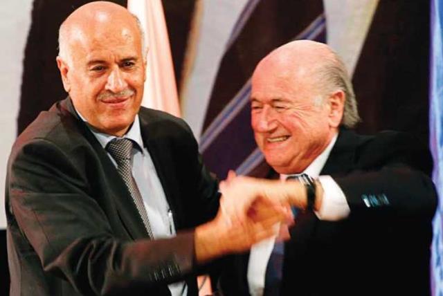 Palestinian Football Association President Jibril Rajoub (L) and FIFA President Sepp Blatter (photo credit: REUTERS)