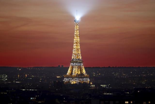 The Eiffel Tower is seen at sunset in Paris (photo credit: REUTERS)