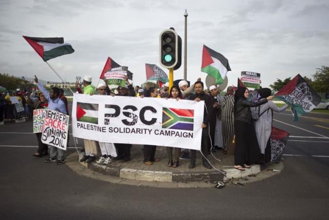 Supporters of the Boycott, Divestment and Sanctions (BDS) campaign protest in Cape Town [File] (photo credit: RODGER BOSCH/AFP)