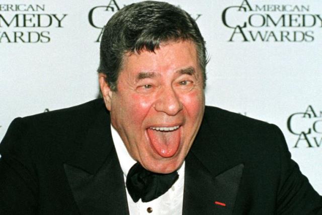 Comedian Jerry Lewis clowns around after receiving the Lifetime Achievement Award at the 12th annual American Comedy Awards, February 22, 1998, in Los Angeles  (photo credit: REUTERS)