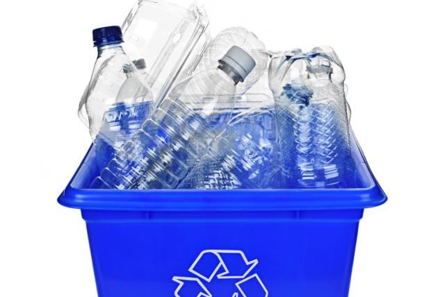 Recycling box filled with clear plastic containers (illustrative) (photo credit: INGIMAGE)