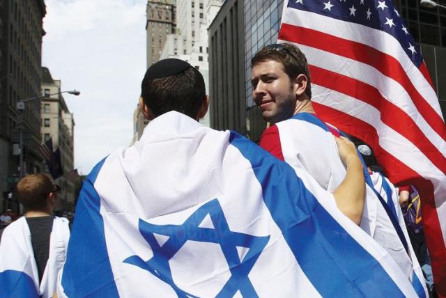 People take part in the 51st annual Israel parade in New York City last year (photo credit: REUTERS)