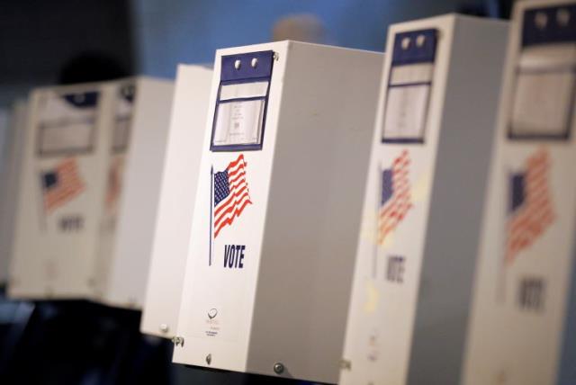 Voting booths are seen during the New York primary elections at a polling station in the Brooklyn borough of New York City, US, April 19, 2016 (photo credit: REUTERS)