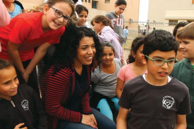 Wafa Hussein,a Muslim elementary school teacher of English and Arabic in a Jewish school in Safed who is loved by her Jewish students and strives for coexistence (photo credit: IGAL HECHT)