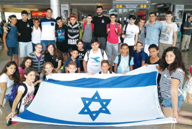 Druze children preparing to depart from Ben-Gurion International Airport (photo credit: IDF WIDOWS AND ORPHANS ORGANIZATION)