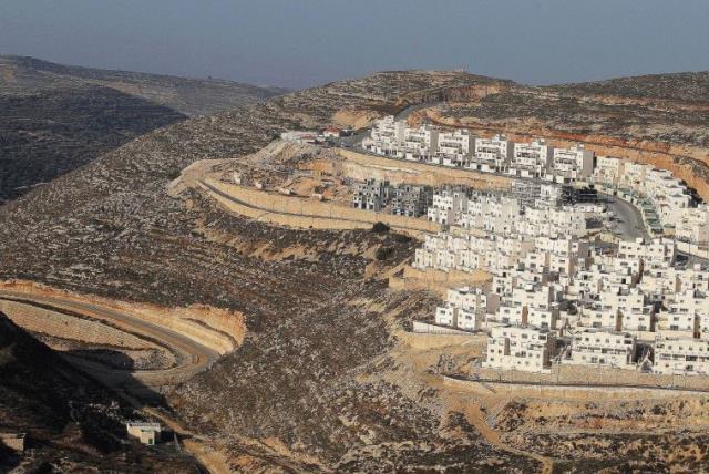 A CONSTRUCTION site in the West Bank settlement of Givat Ze’ev, near Jerusalem [File] (photo credit: REUTERS)