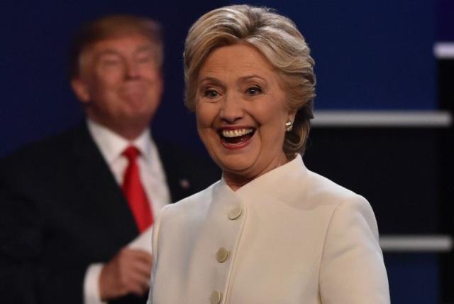 Trump and Clinton (photo credit: PAUL J. RICHARDS/AFP)