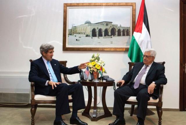 US SECRETARY of State John Kerry meets Palestinian Authority President Mahmoud Abbas in Ramallah in 2013. (photo credit: REUTERS)