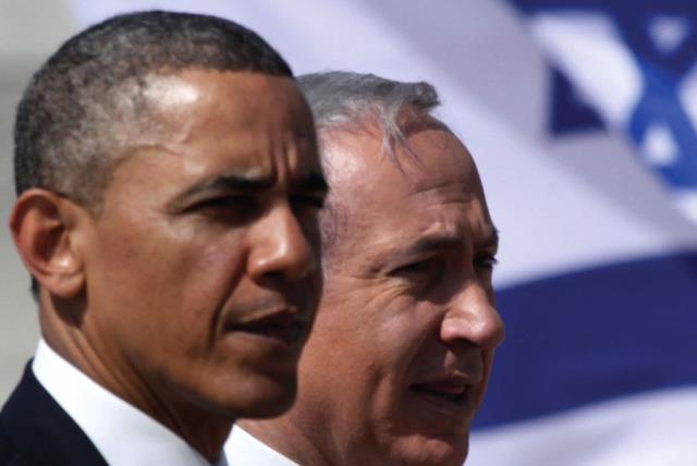 PRIME MINISTER Benjamin Netanyahu stands with President Barack Obama (photo credit: MARC ISRAEL SELLEM/THE JERUSALEM POST)