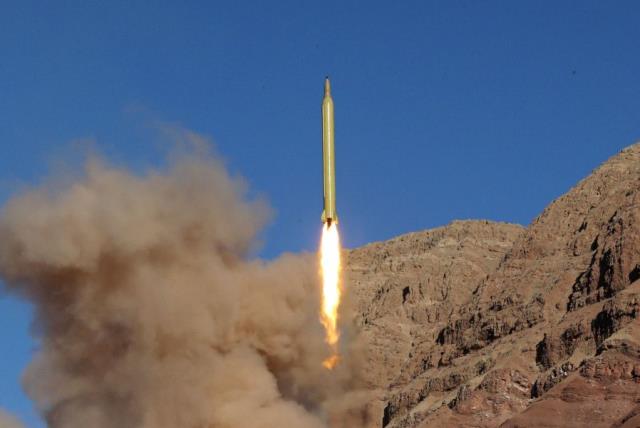 A ballistic missile is launched and tested in an undisclosed location, Iran, March 9, 2016.  (photo credit: REUTERS)