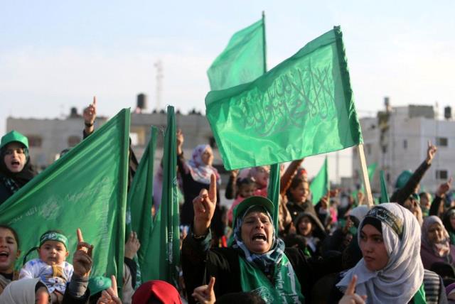 Palestinians take part in a rally marking the 29th anniversary of the founding of the Hamas movement, in Rafah in the southern Gaza Strip December 16, 2016 (photo credit: REUTERS)