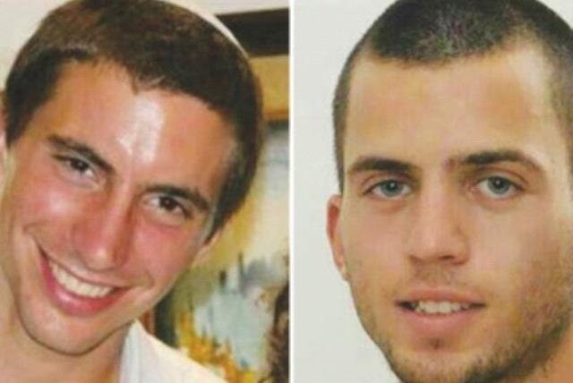 Lt. Hadar Goldin (left) and St.-Sgt. Oron Shaul were killed in action in the war against Hamas in 2014 (photo credit: Courtesy)