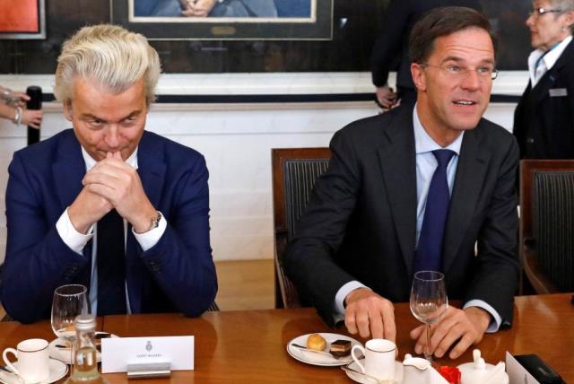 Dutch Prime Minister Mark Rutte (R) of the VVD Liberal party and Dutch far-right politician Geert Wilders of the PVV Party (photo credit: REUTERS)