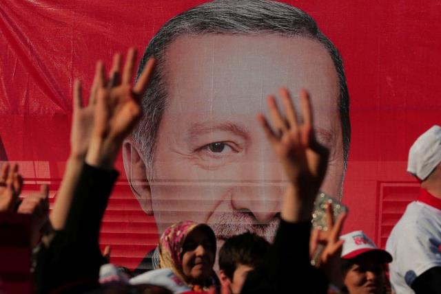 Supporters listen to the speech by Turkish President Tayyip Erdogan during a rally for the upcoming referendum in Istanbul, Turkey (photo credit: REUTERS)