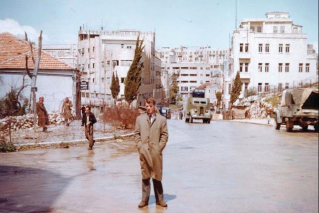 Robert F. (Bobby) Kennedy standing on Julian’s Way, Jerusalem, known today as King David Street, April 1948. Barbed wire and a British Army checkpost can be seen in the background (photo credit: PHOTO COURTESY OF THE KENNEDY FAMILY/RFK MEMORIAL /JOHN F. KENNEDY LIBRARY)