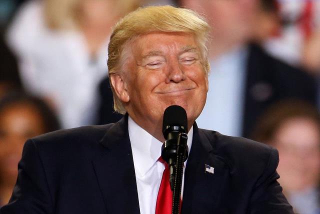 US President Donald Trump appears on stage at a rally in Harrisburg, Pennsylvania, US April 29, 2017.  (photo credit: REUTERS)