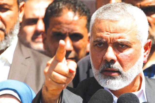 HAMAS LEADER Ismail Haniyeh gestures during a news conference in Gaza City earlier this month (photo credit: REUTERS)