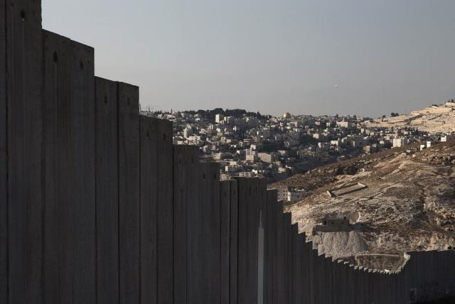 The security barrier leading up to Jerusalem (photo credit: FINBARR O'REILLY / REUTERS)