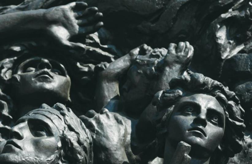 A part of the scene on the Monument to the Ghetto Heroes in Warsaw. (photo credit: KACPER PEMPEL/REUTERS)