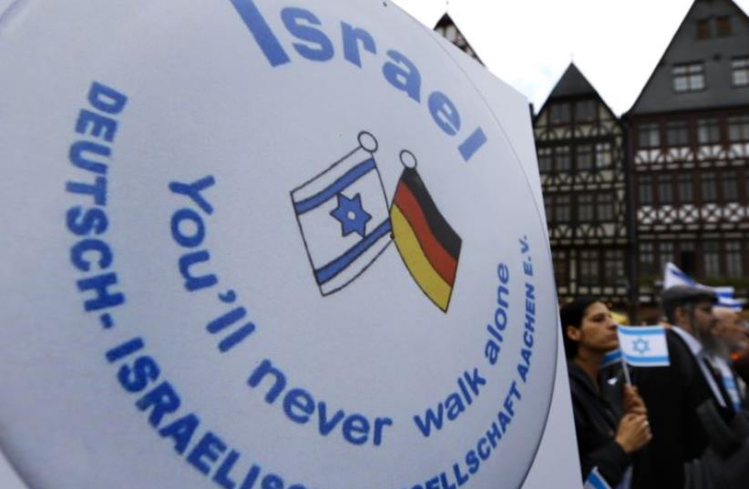 Protesters attend a rally against anti-Semitism in Frankfurt (photo credit: REUTERS)