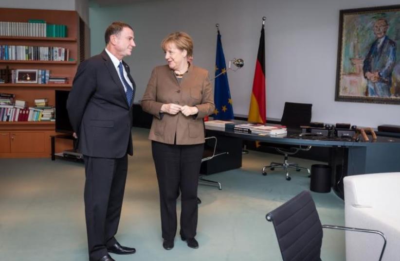 German Chancellor Angela Merkel (R) and Knesset Speaker Yuli Edelstein meet in her office in Berlin (photo credit: BOAZ ARAD)