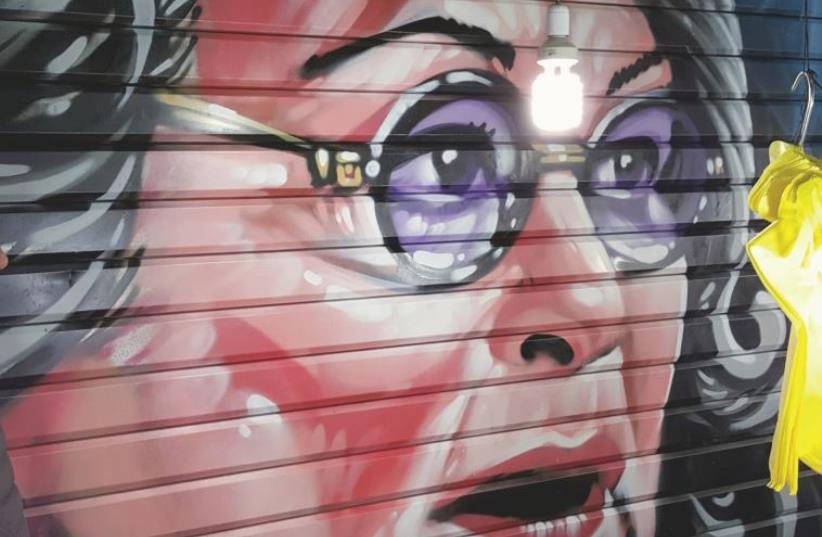 Graffiti Portrait of Roseanne in Jerusalem's Mahane Yehuda market by Painter Solomon Souza (photo credit: FMHT STUDIOS)