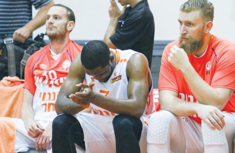 Ironi Ness Ziona players (from left) Yuval Naimi, Ivan Aska and Igor Nesterenko (photo credit: DANNY MARON)