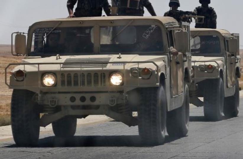 A Jordanian army convoy  (photo credit: REUTERS)