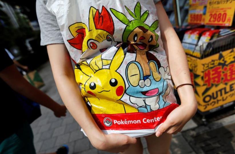 A shopping bag of Pokemon [Illustrated] (photo credit: REUTERS)