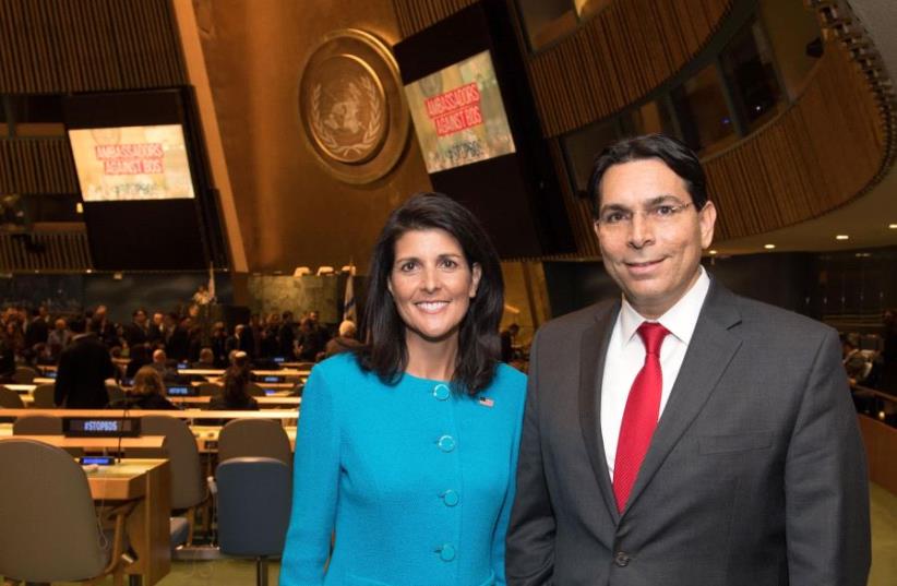 Ambassador Danny Danon and Ambassador Nikki Haley entering the UN General Assembly Hall (photo credit: SHAHAR AZRAN)