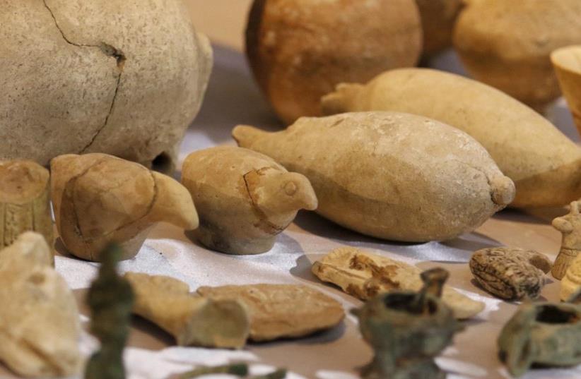 Ancient Iraqi artifacts at the National Museum in Baghdad (photo credit: THAIER AL-SUDANI/REUTERS)