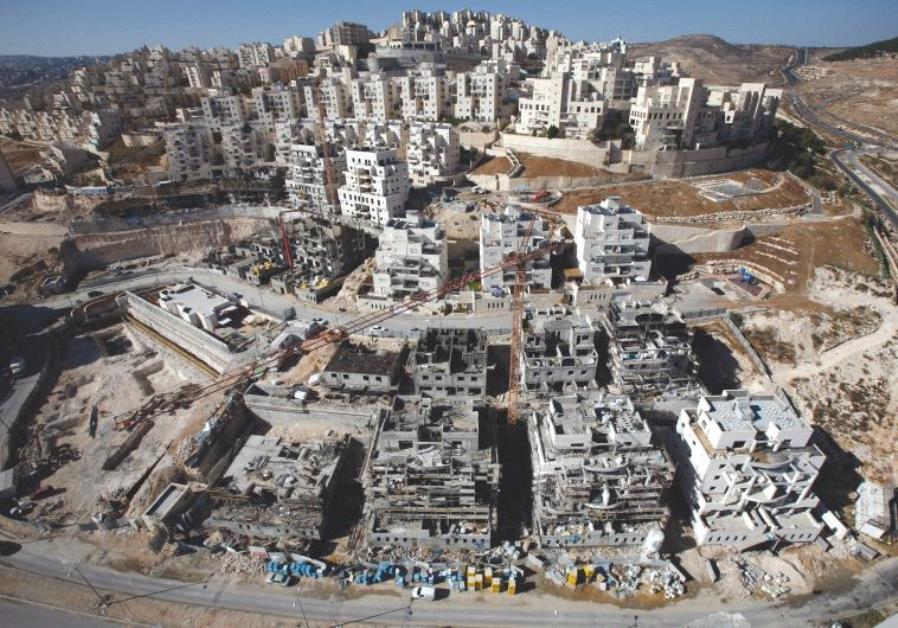 HOUSES UNDER construction in the Har Homa neighborhood of Jerusalem in 2010