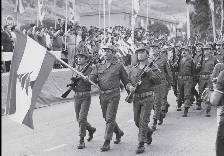 A unit from the South Lebanon Army marches in a Yom Ha’atzmaut parade in Kiryat Shmona in 1982. (credit: HERZ/JERUSALEM POST ARCHIVES)