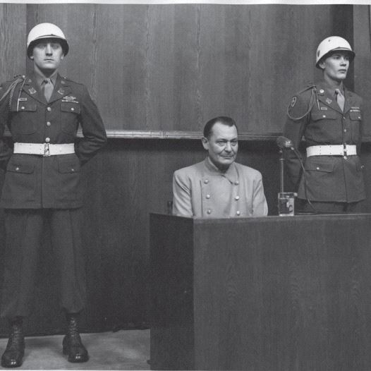 Hermann Goering, pictured at the 1945 Nuremberg Trials, was described by an American warden as a ‘simpering slob’ (credit: Wikimedia Commons)