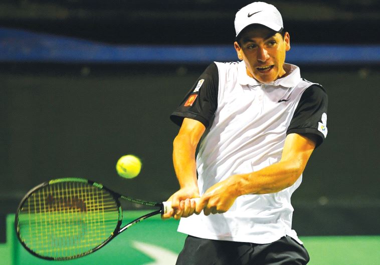 Israeli tennis fans got a look into the future on Sunday when Yshai Oliel won his exhibition match following the completion of the national team’s Davis Cup win over Sweden at Ramat Hasharon. (credit: ALEX GOLDENSTEIN/ISRAEL TENNIS ASSOCIATION)